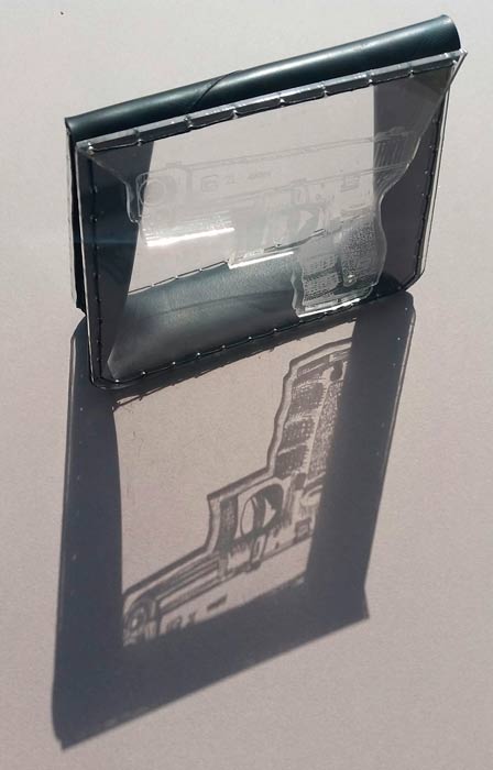 aug2016-mann-glockclutchview1-700hi