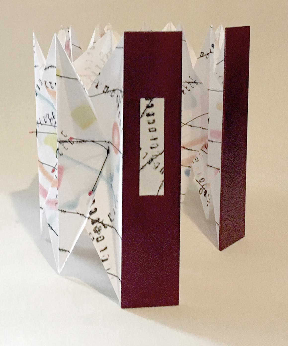  Barbara Brown, "Folded structure with symbols" 8"h x 17" w (extended) 