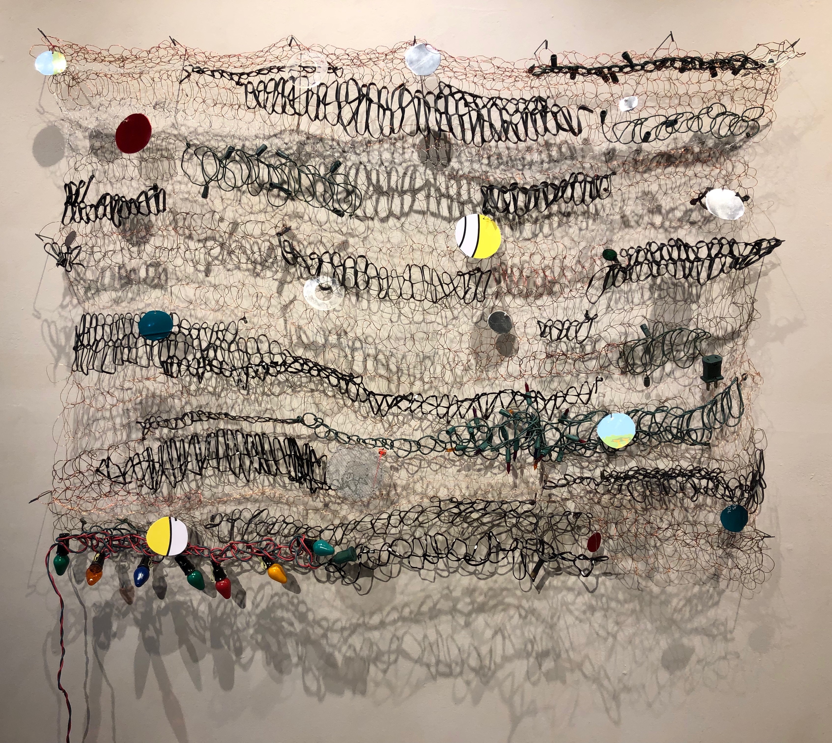 The New Normal, wire, rubber, leather, found objects, 43 x 45 x 5"